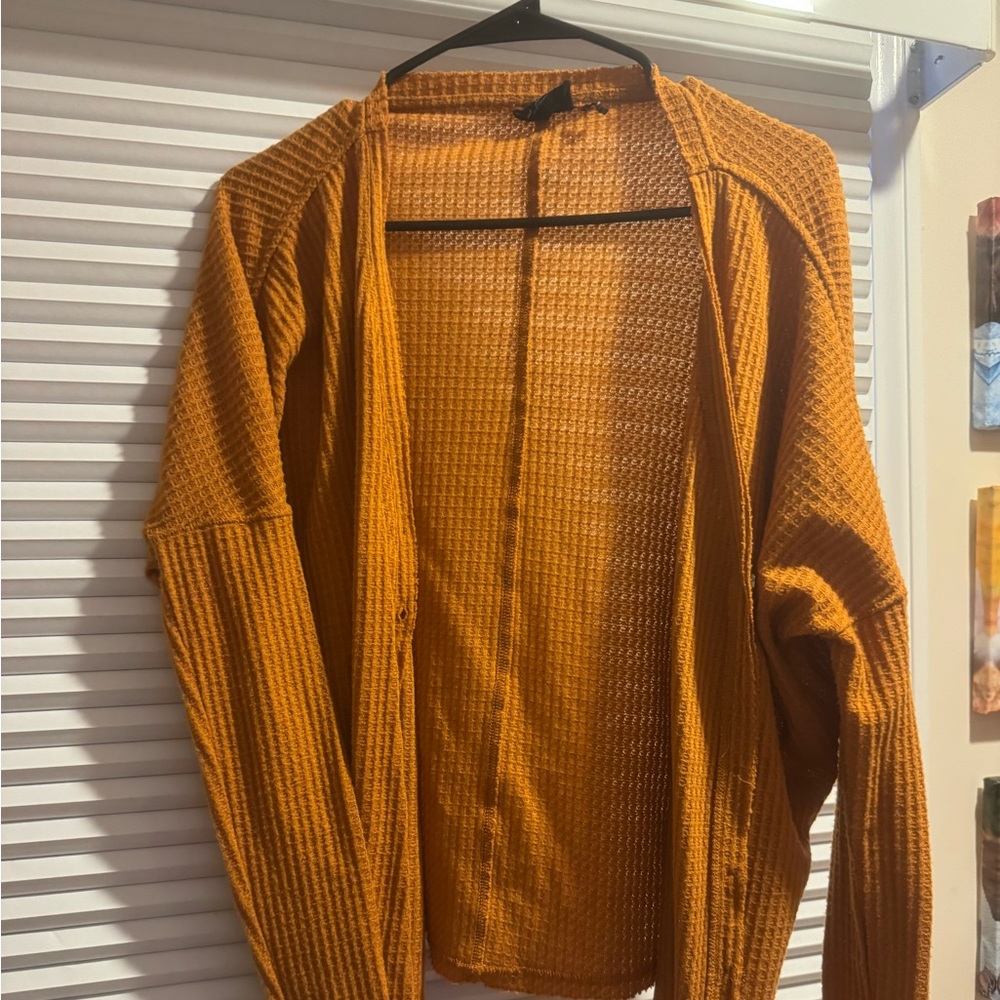 Urban outfitters women’s oversized thermal button down. This shirt is mustard